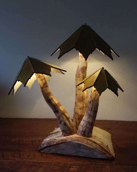 The "Spring Glory" lighted sculpture is part of the Mushroom collection which is very organic in design